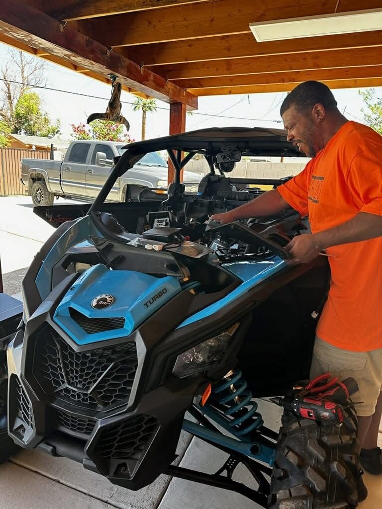 ProWorks Audio installing audio on a Can-Am Maverick on site